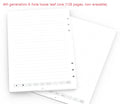 Loose leaf spiral notebook replacement paper core with pen and pencil refills on a table.