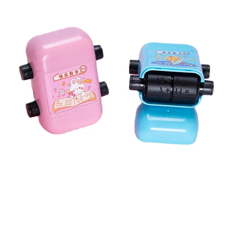 Children's maths stamp roller for addition subtraction multiplication division practice in pink plastic cuboid shape
