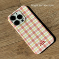 iPhone 15 Pro Max phone case with plaid design in red or orange grid pattern