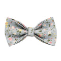 Blue floral patterned adjustable dog collar with matching leash, bow, and vest on a white background.
