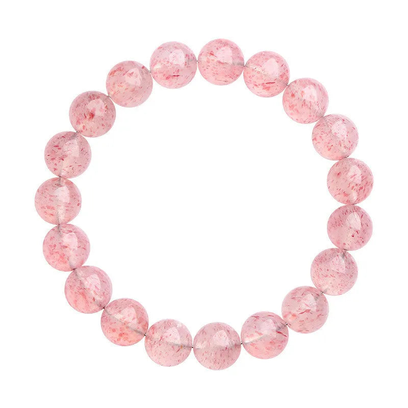 Natural strawberry quartz crystal bracelet with white water geometric beads on elastic cord.
