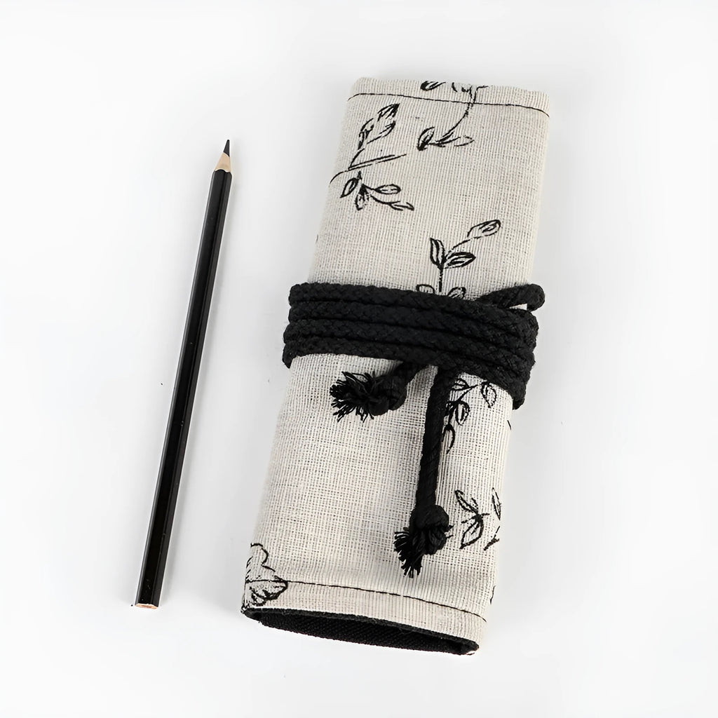 Black Peony printed canvas pencil roll bag open to show 24 or 72 holes for pencils on cotton hemp fabric.