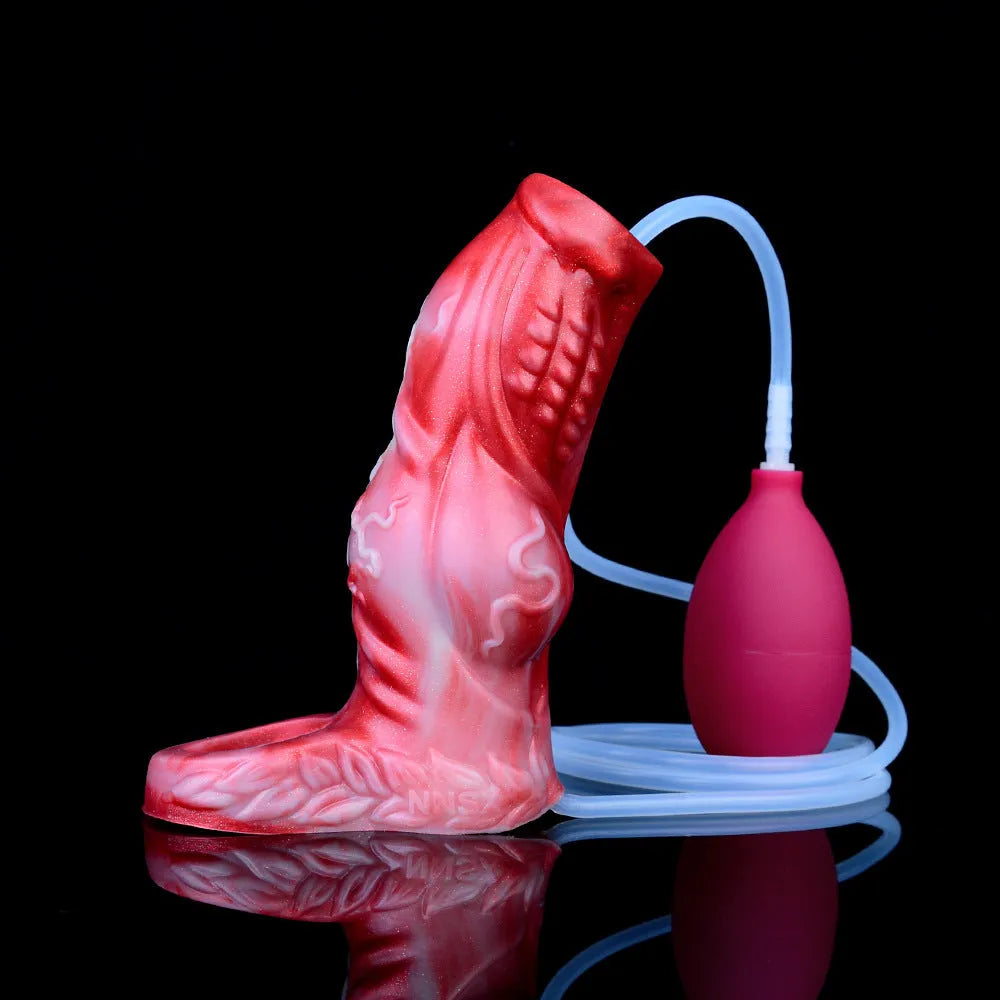 Manual water spray silicone exotic condom adult toy with syringe, airbag, and balloon components on a plain background.