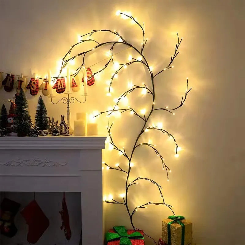Flexible plastic LED vine garland with warm white lights shaped on a wall.