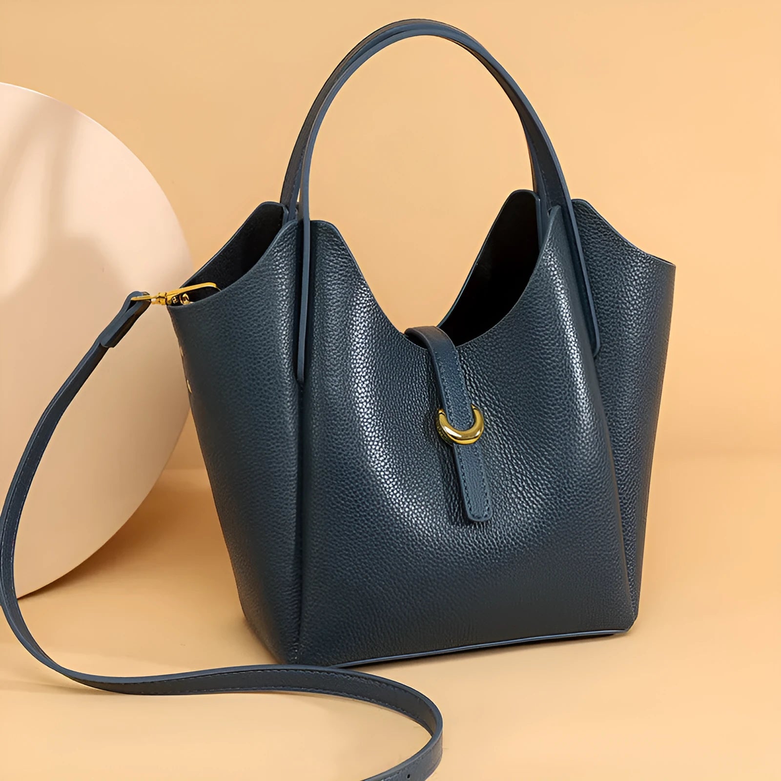 Genuine leather women's bucket bag with hand holding design in retro European American style