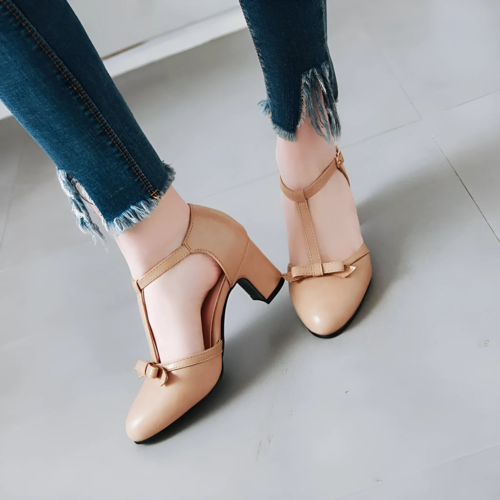 Women's apricot PU chunky heel sandals with bow detail and buckle strap on a 6.5cm heel.