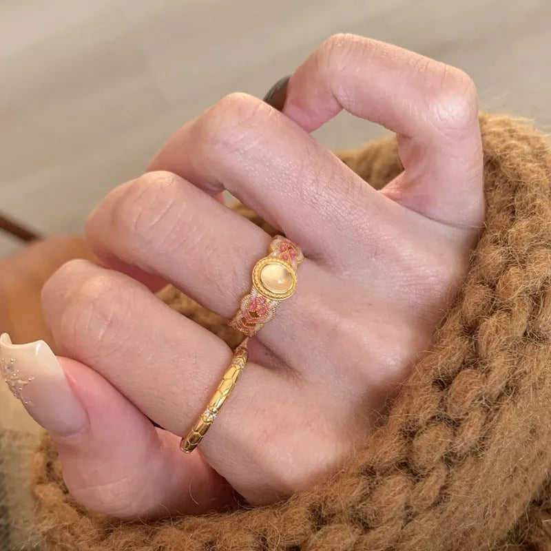 Geometric open band women's ring with pink crystal enamel on copper gold plating, colour K227.