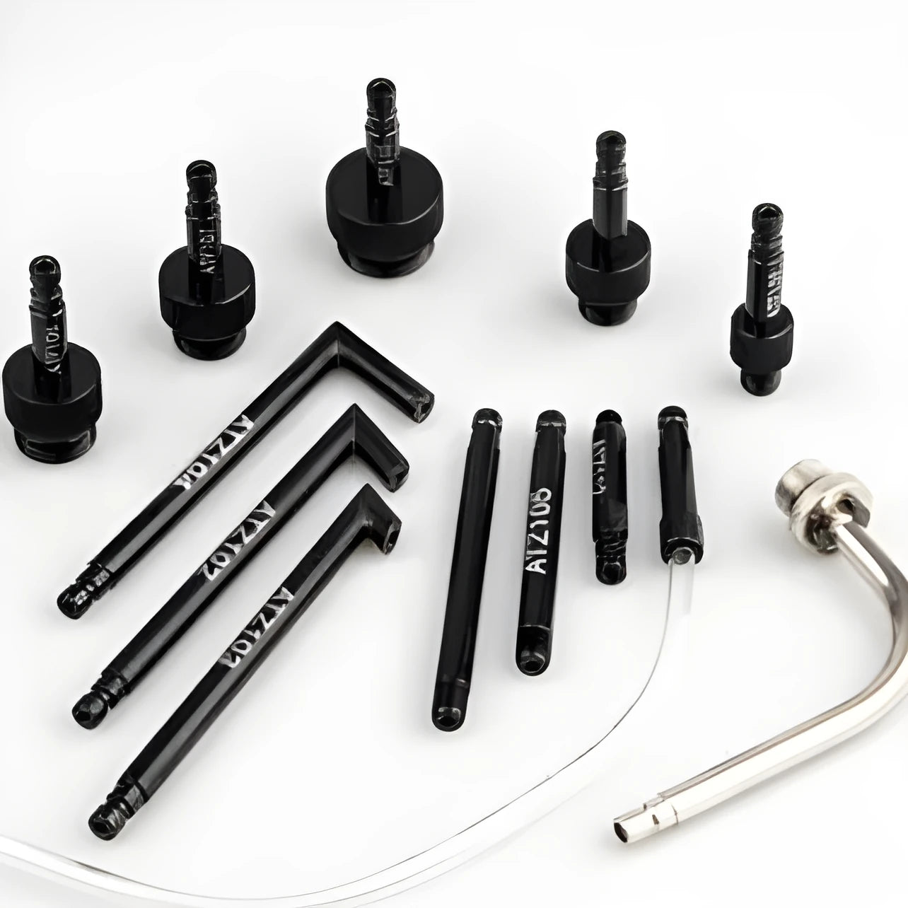 Thirteen-piece automatic transmission oil refuelling tool kit with injector and wave box connector.