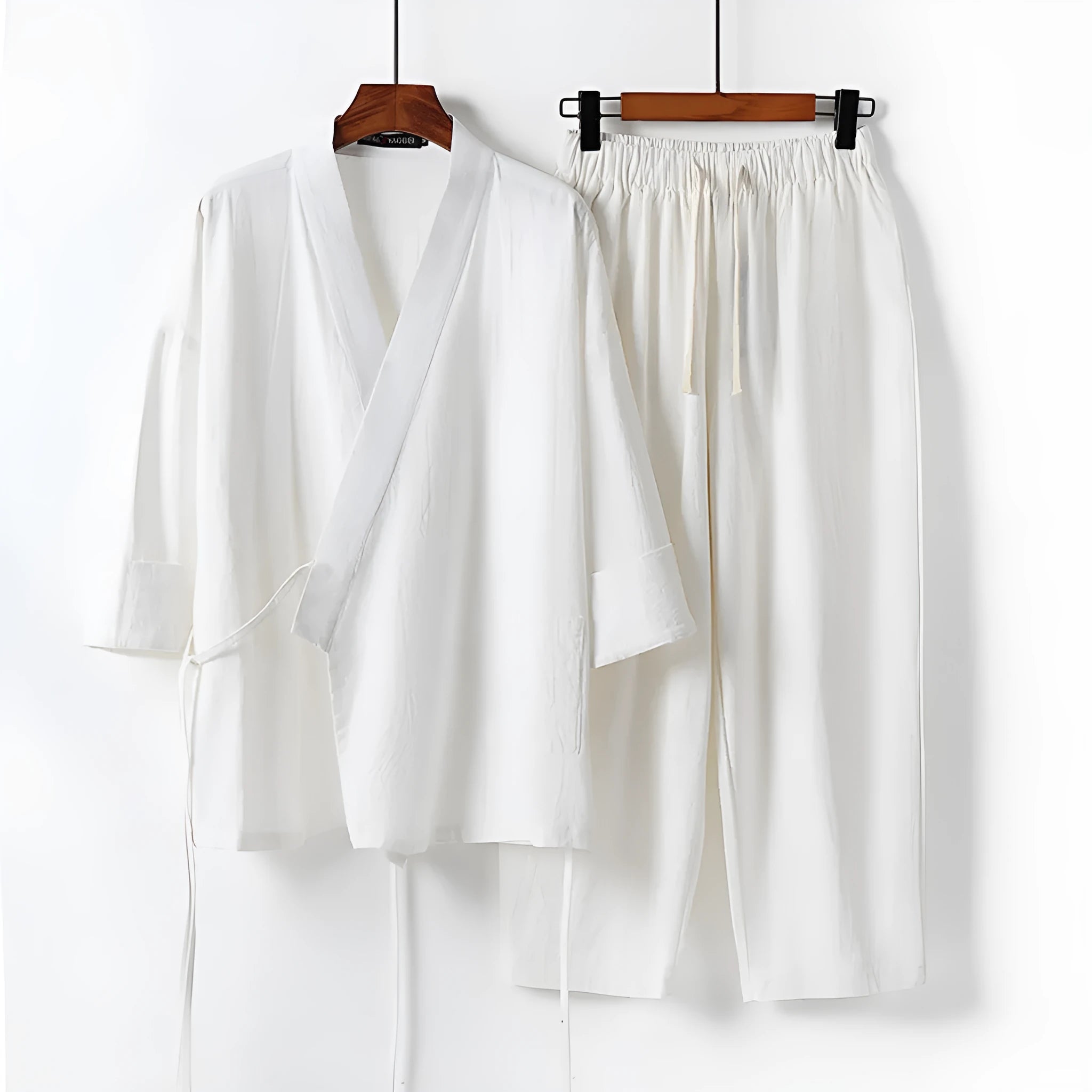 Cotton cardigan Hanfu two-piece suit in apricot, showing shirt-style jacket and wide-leg trousers.
