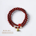 Purple gold sand cinnabar bracelet with double circle design and lotus seedpod centre