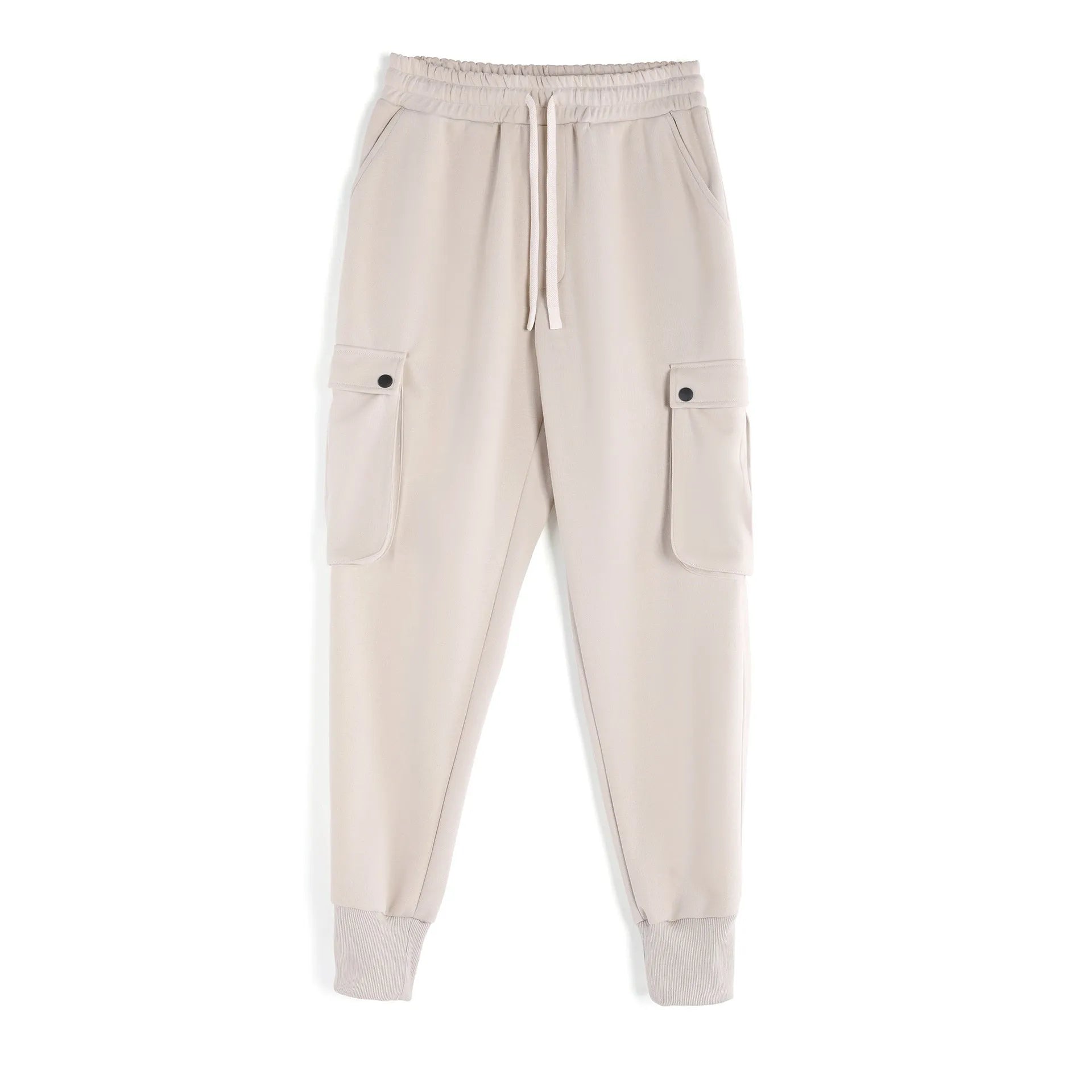 Men's loose light grey cotton trousers with ankle ties and multiple pockets laid flat.