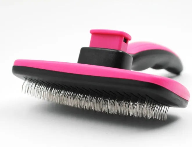 Rose red self-cleaning pet comb with stainless steel teeth and ergonomic handle for removing dog and cat hair