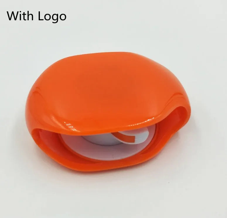 Automatic earphone cable retractor winder in multiple colours on a white background.