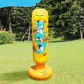 Tall yellow inflatable boxing column standing upright on a floor.