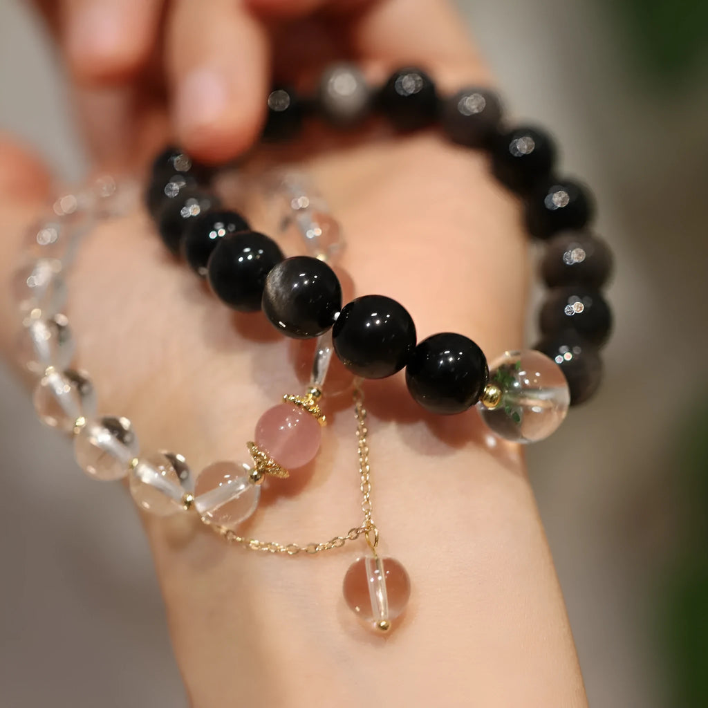 White crystal geometric bracelet with cat eye obsidian and Chinese auspicious patterns