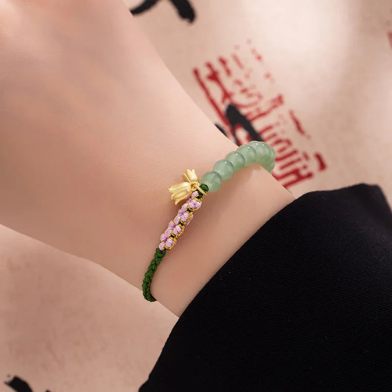 Red rope hand woven bracelet with lily carrying strap design in national style for women