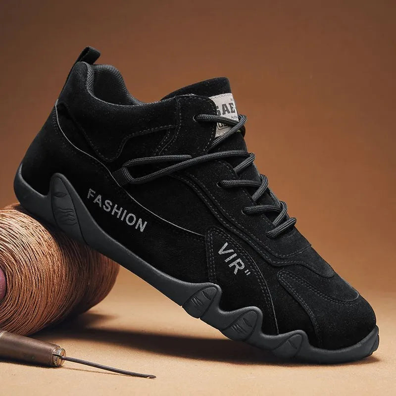 Men's grey low-cut slip-on work shoes with non-slip sole and elastic band.