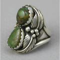 Women's silver-toned geometric alloy ring with a square turquoise blue inlaid centre on a white background.