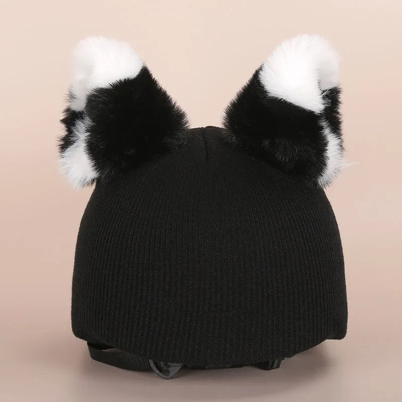 Soft plush ski helmet decoration hat with a cute cartoon design in various colours.