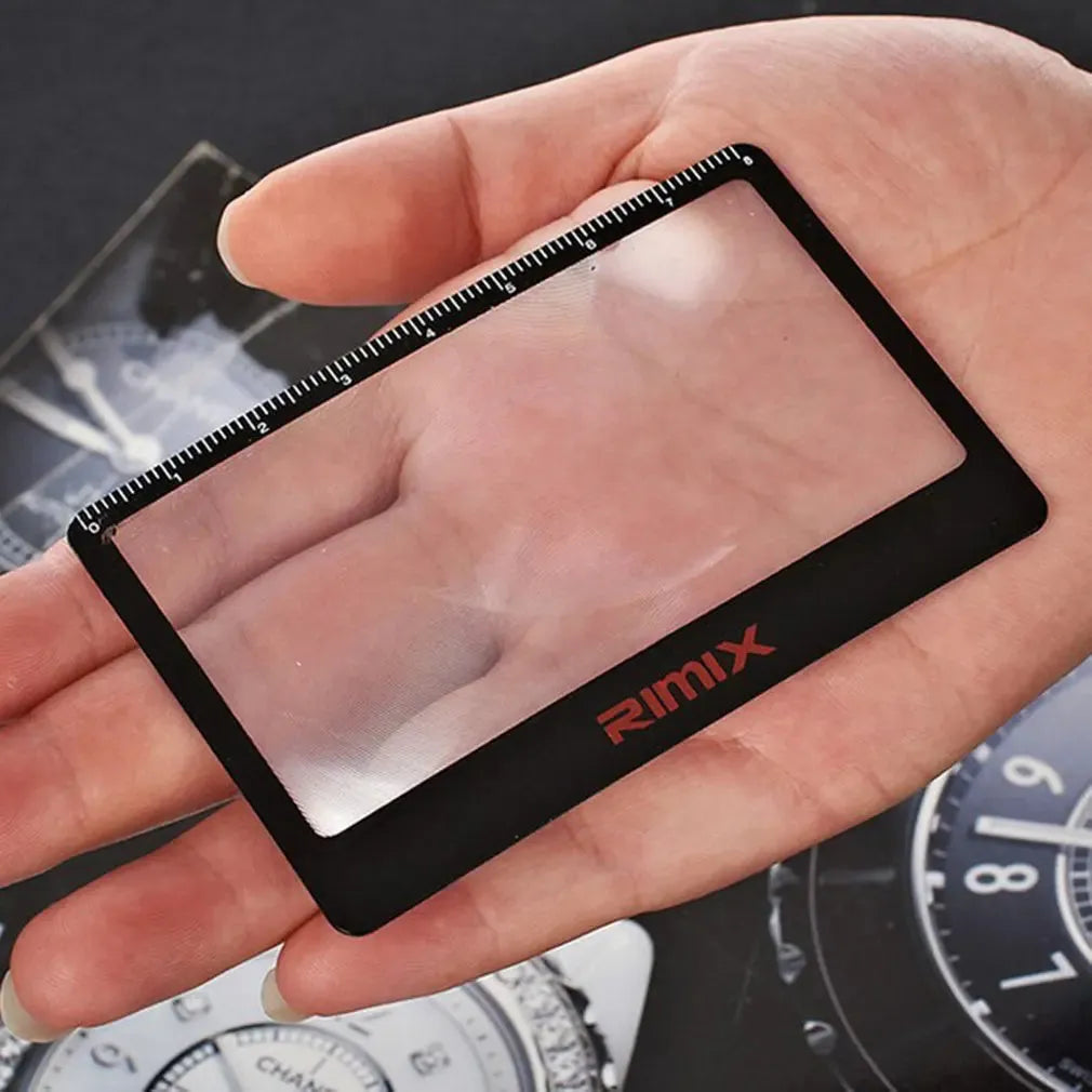 Credit card sized plastic magnifier in black or white colour for portable reading assistance