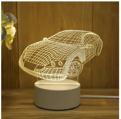 3D acrylic USB LED night light with unicorn design and warm white projection on a desk