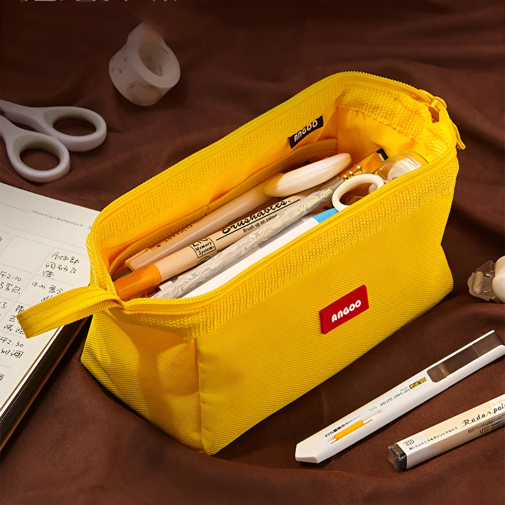 Large Oxford cloth pencil case with double zipper open, showing spacious interior, in yellow colour.