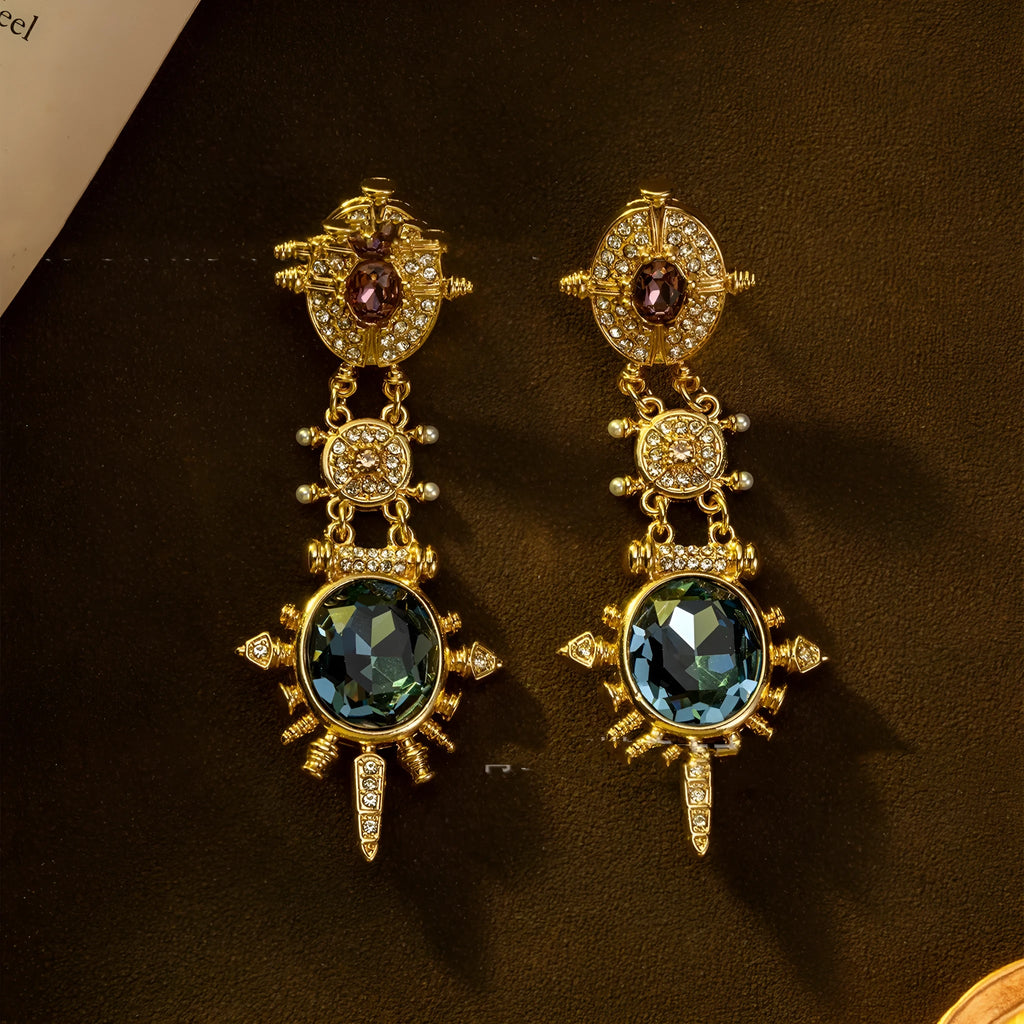 Gold geometric round stud earrings with diamond treatment surface detail