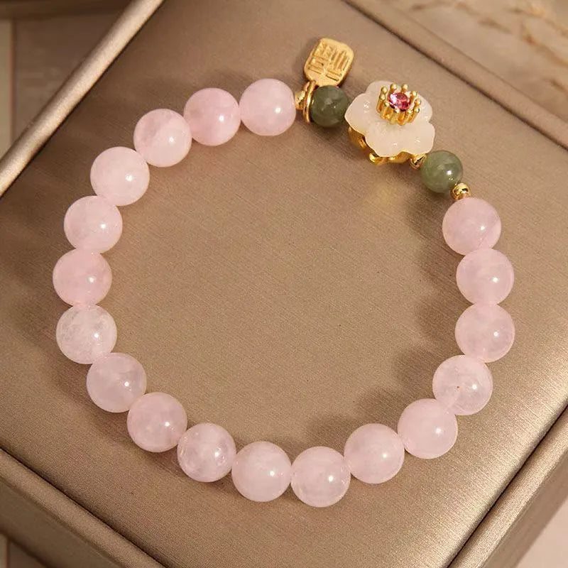 Women's crystal bracelet with peach blossom design and Hetian jade beads in blessing card colour