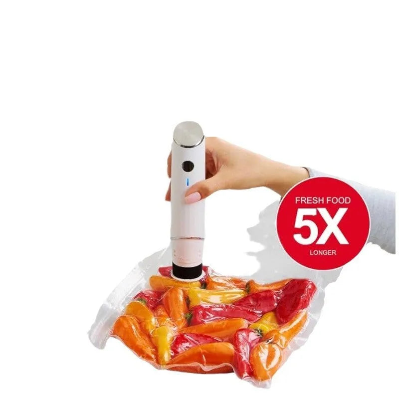 White USB electric vacuum sealer pump with five clear plastic food storage bags