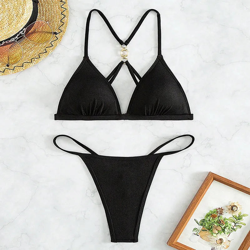 Black women's hollow backless triangle bikini set with adjustable tie-side pants