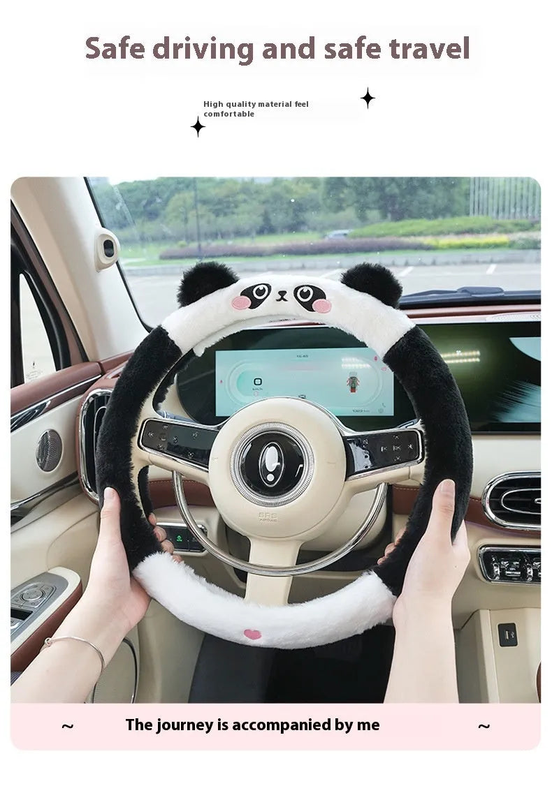 Plush rabbit fur car steering wheel cover with embroidered animal design, shown fitted on a 38cm wheel.