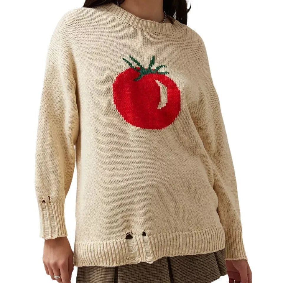 Women's beige acrylic jacquard loose-fitting pullover sweater with round neck and long sleeves.