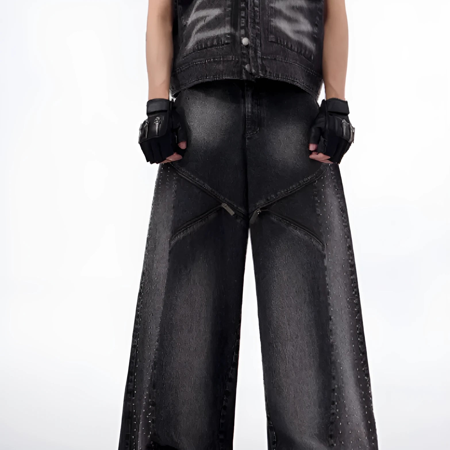 Black and grey washed denim wide leg trousers and vest set on a hanger