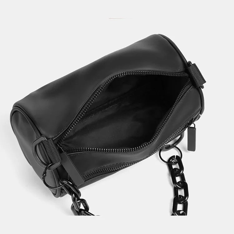 Black waterproof Oxford cloth messenger bag with a chain detail, shown as a crossbody bag.