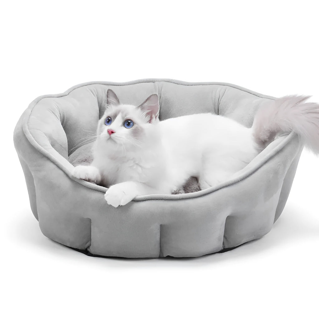 Grey plush cat kennel with an integrated hammock, showing soft interior and dimensions of 46cm wide.