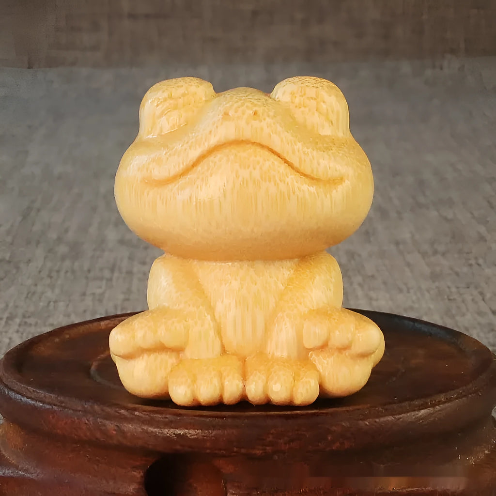 Smiling frog solid bamboo carving ornament with cartoon style measuring 5cm tall