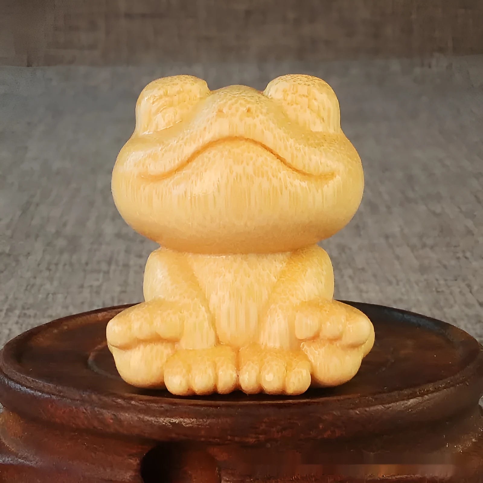 Smiling frog solid bamboo carving ornament with cartoon style measuring 5cm tall