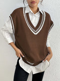 Women's college style wool vest sweater in loose fit pullover design showing black, blue and coffee colour options