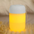 Small white cylindrical USB mini humidifier for desk or bedside use.