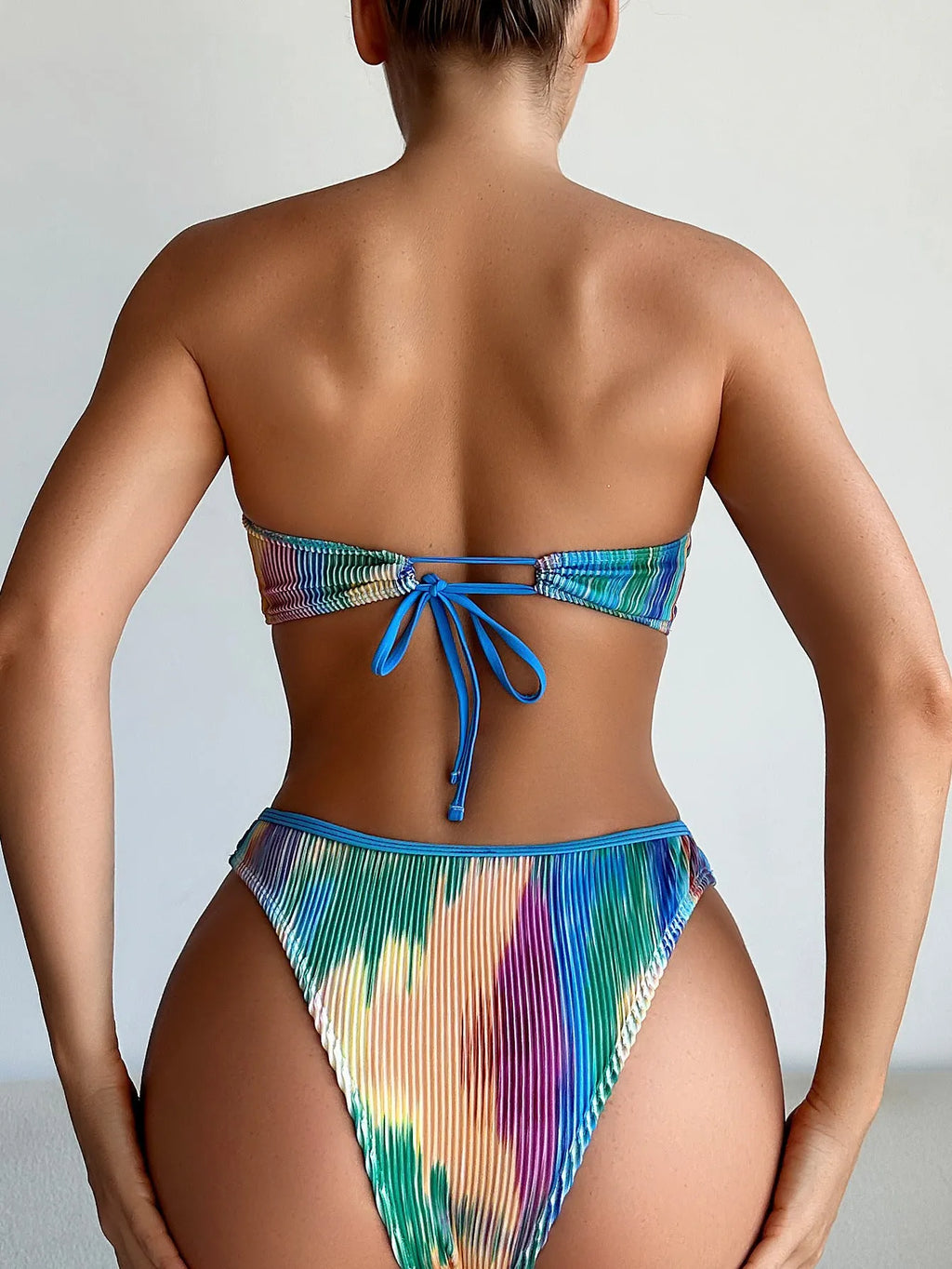 Colour-printed women's tube top bikini set with matching briefs on a white background.