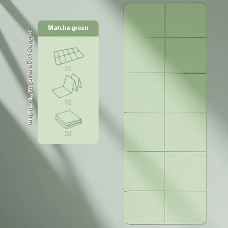 A folded and unfolded purple TPE yoga mat on a wooden floor, showing its size and folding design.