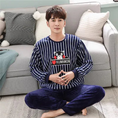 Long sleeve padded flannel pajama suit in cotton with round neck, blue colour, set includes top and trousers for winter sleepwear.