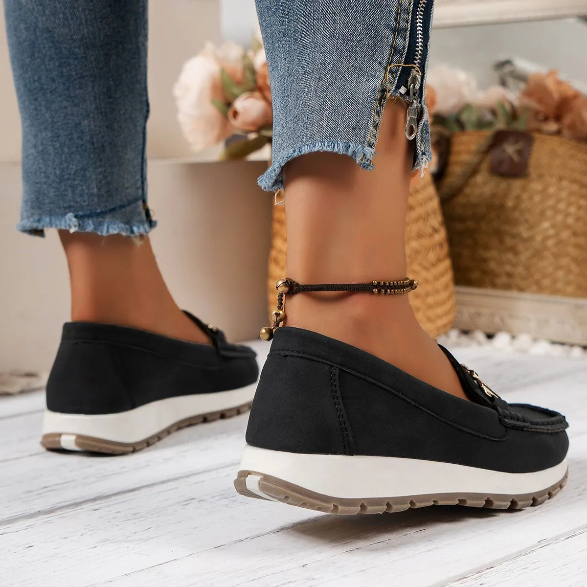 Women's non-slip PU leather loafers in beige with round toe and hollow-out side panels on a white background