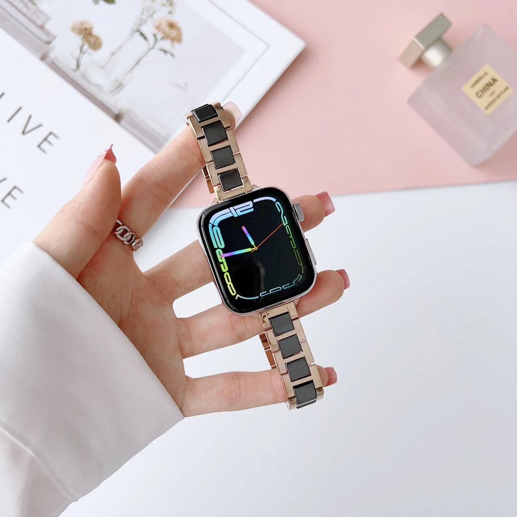 Stainless steel ceramic watch band for Apple Watch 38-49mm in gold with black ceramic finish on a wrist