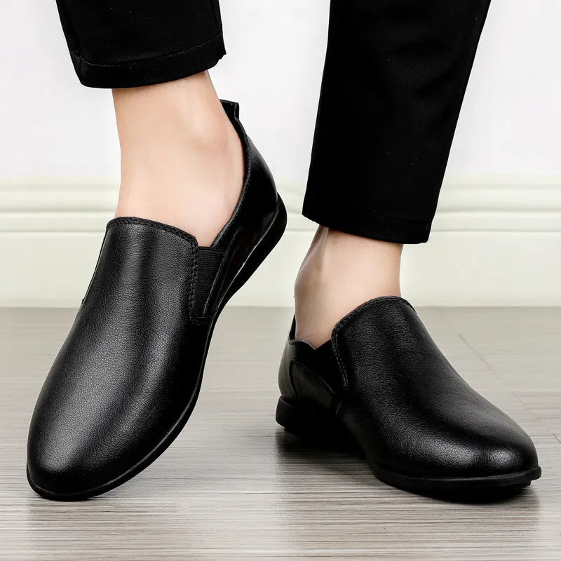 Men's black leather business shoes with rounded toe and breathable construction on size guide