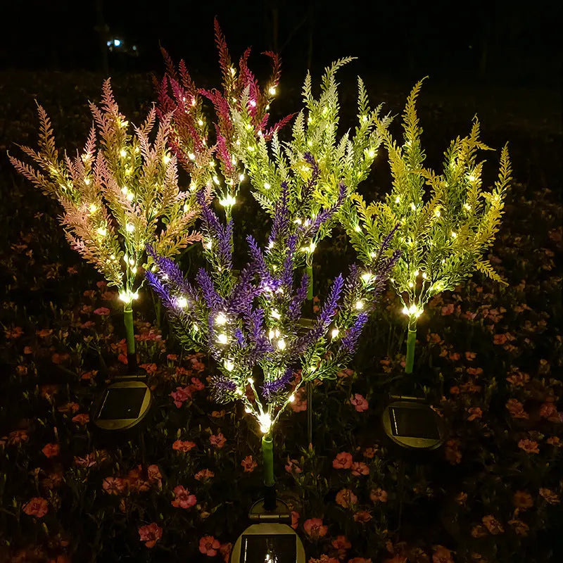 74cm tall solar-powered LED flower garden light in lavender colour options.