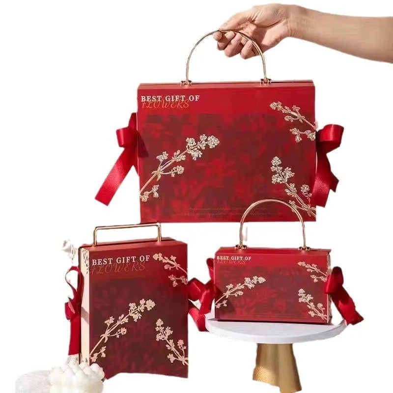 Paper cardboard hand gift box for girls pajamas in champagne gold colour with ribbon handle