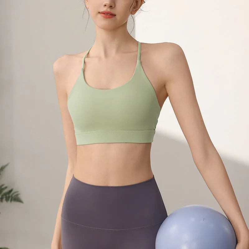 Women's nylon sports vest with double shoulder straps in various colours for athletic activities