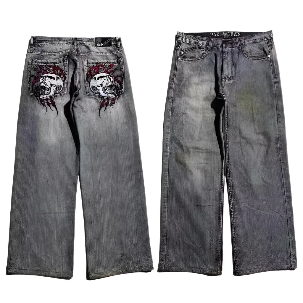 Gray washed-out denim jeans on a man, showing straight wide-leg cut and vintage workwear style.