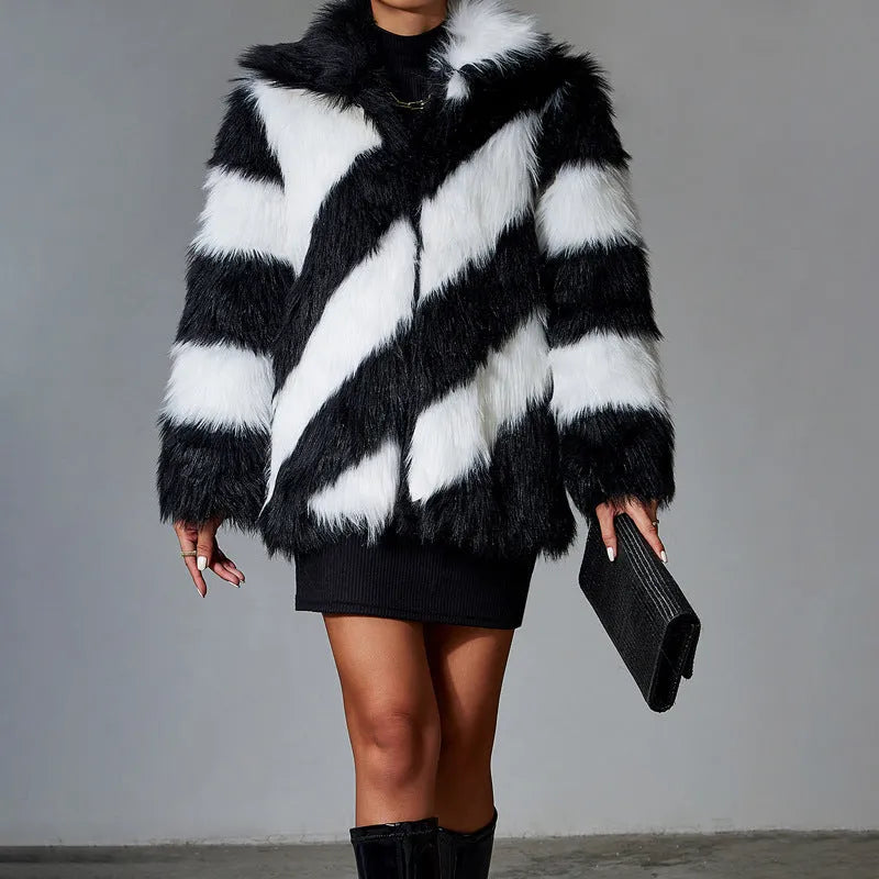 Women's faux fur coat with contrast colour lapel and a matching fur collar.